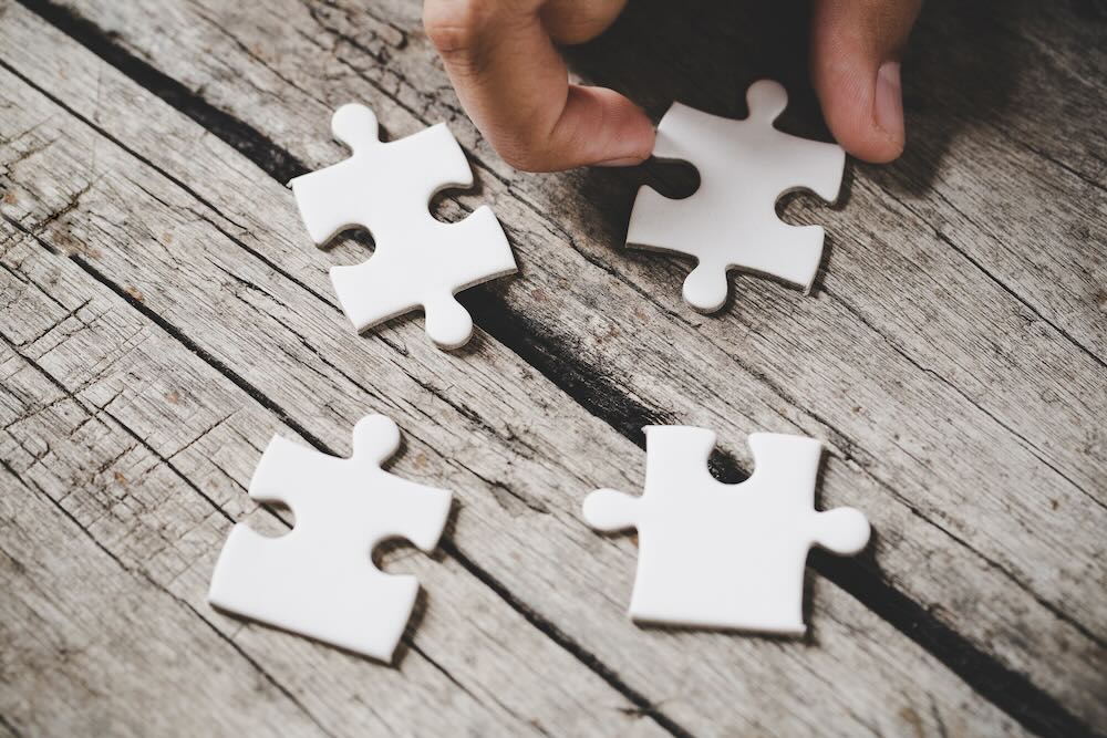 four pieces of white jigsaw